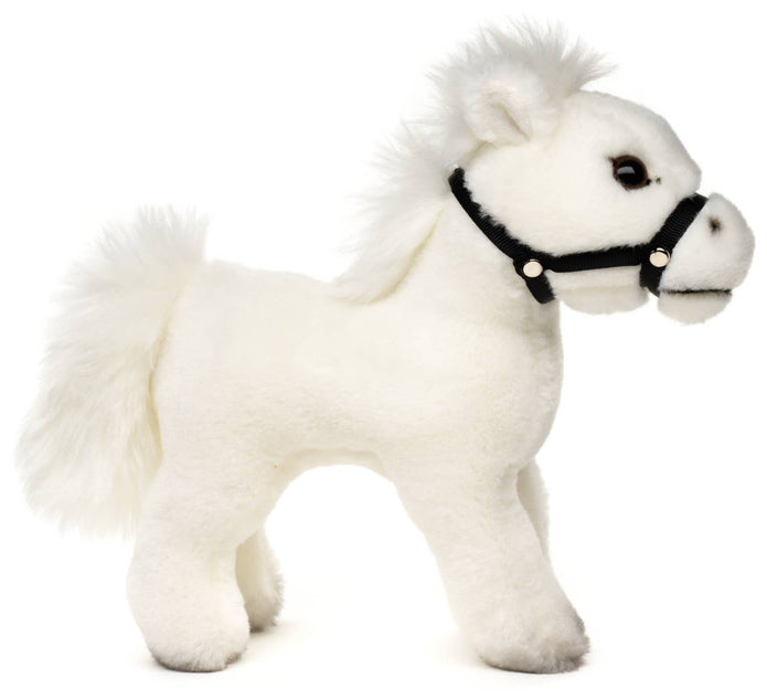 Seisova valkoinen hevonen